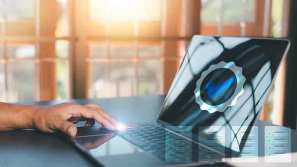 istock Businessman working laptop, virtual approval mark Great Business Assurance Ideas Audit approval form or report Satisfaction from checklists, certifications and assurances that passed quality standard 1435006840