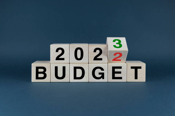 istock Budget 2022 - 2023. Cubes form the words Budget 2022 - 2023. 1435008461