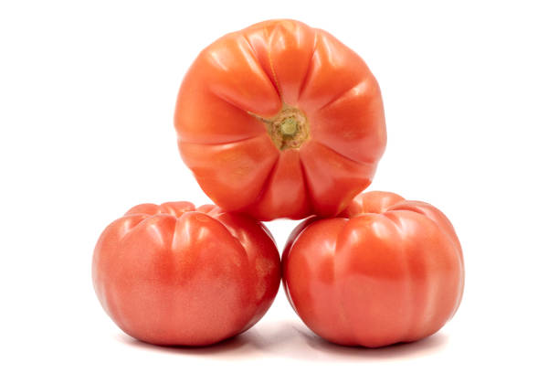istock Tomato isolated on white background. Organic farming. close up 1435015375