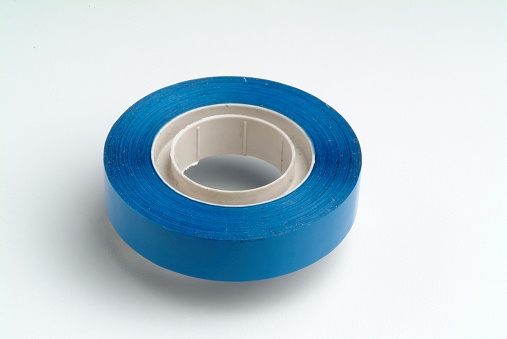 Blue adhesive tape on white background.