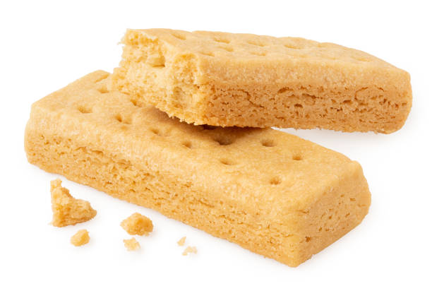 Two butter shortbread finger biscuits. One partially eaten.