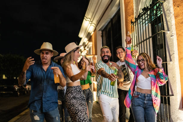 istock Friends having fun on the city at night 1435022208