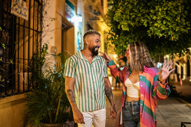istock Couple talking on the street at night 1435024571
