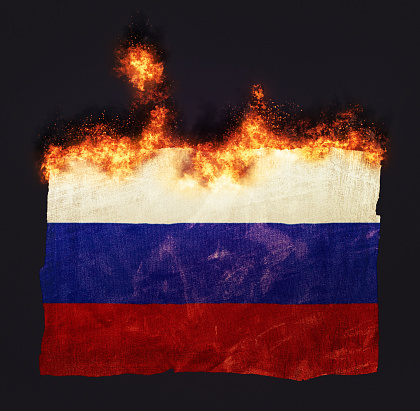 Flag of Russia going up in flames.