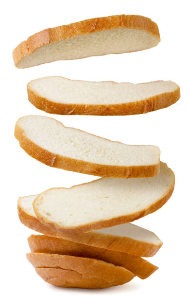 istock Sliced bread falls on a pile on a white background. Isolated 1435026760
