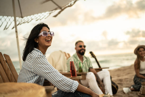 istock Friends having fun on the beach 1435030583