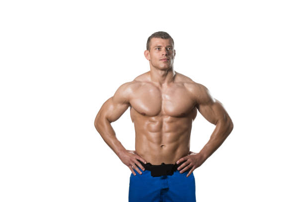 Muscular Bodybuilder Man Posing Over White Background stock photo