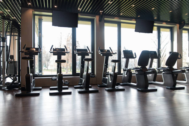istock Large Modern Gym With Workout Equipment 1435035185