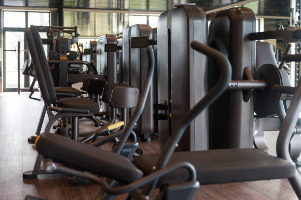 istock Exercise Machines In A Modern Gym 1435035216