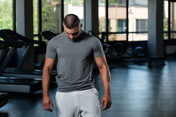 istock Muscular Man Posing In Gray T-shirt 1435035654