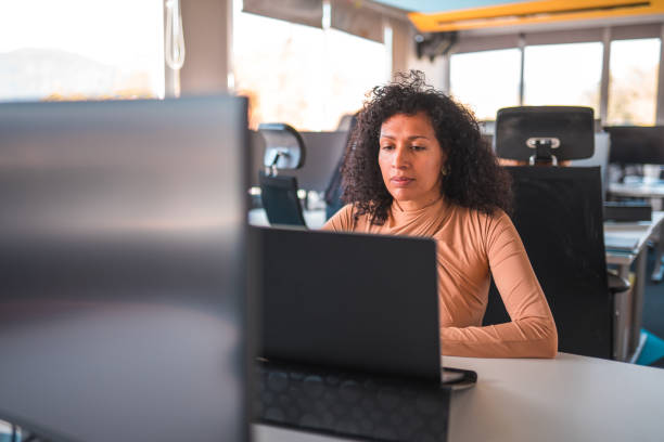 istock Mature Female Manager Working With A Laptop 1435037133