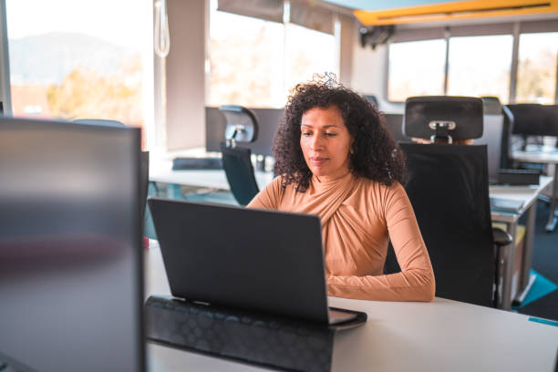 istock Mature Female Manager Working With A Laptop 1435037135
