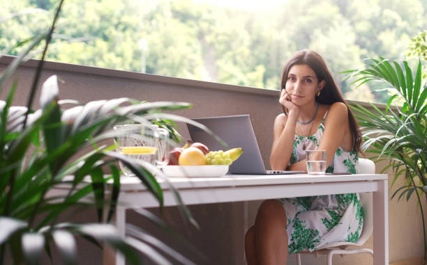 istock Young woman posing in the balcony 1435037152