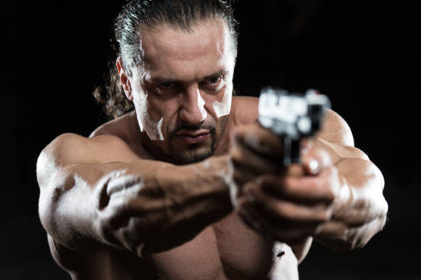 istock Soldier Drawing A Gun In Self Defense 1435037946
