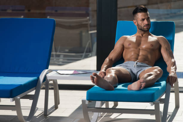 istock Young Athlete Resting On Sun Lounger 1435038182