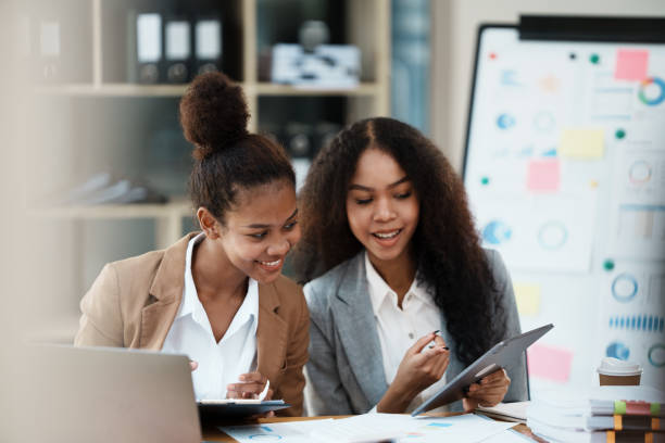istock Woman using a laptop at a office 1435040769