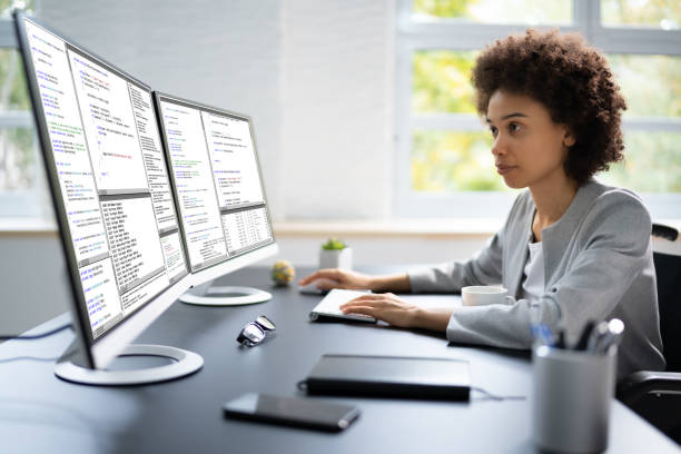 istock African American Woman Programmer. Girl Coding 1435042853
