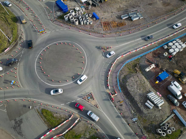 Aerial view of a temporary roundabout made from traffic cones in major roadworks Aerial view of a temporary roundabout made from traffic cones in major roadworks merthyr tydfil stock pictures, royalty-free photos & images
