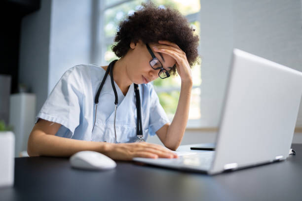 istock Frustrated Overworked Doctor In Hospital Looking 1435043430