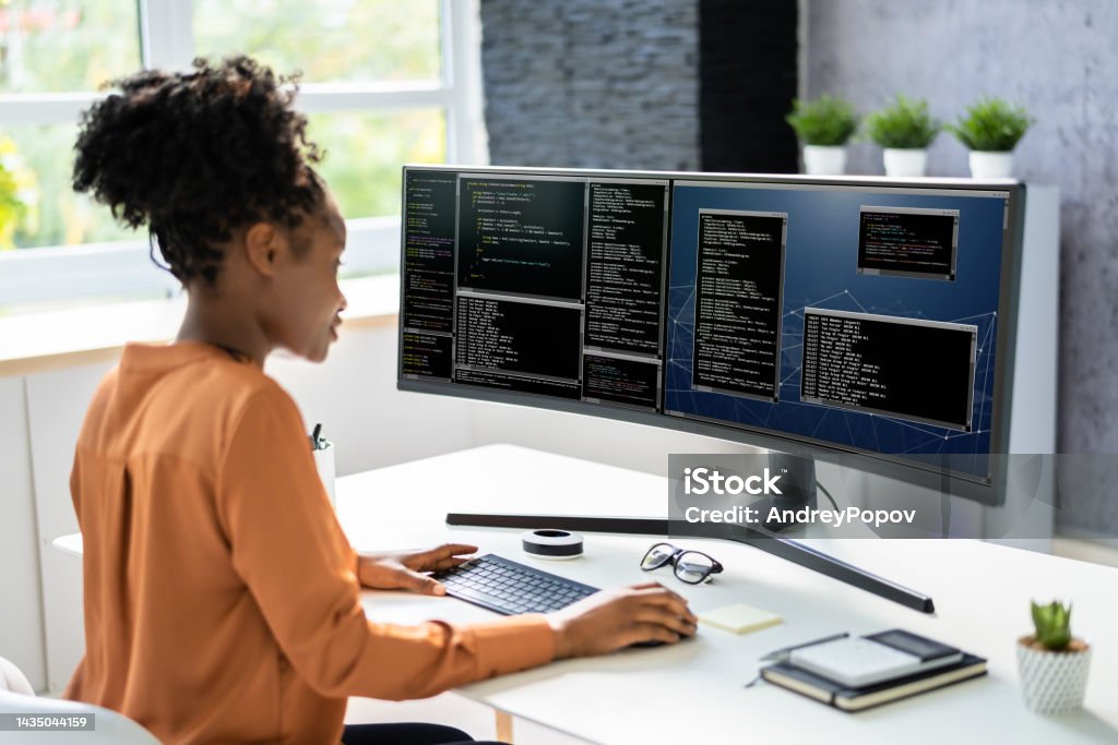 Computer Programmer Writing Program Code On Computer Stock Photo ...