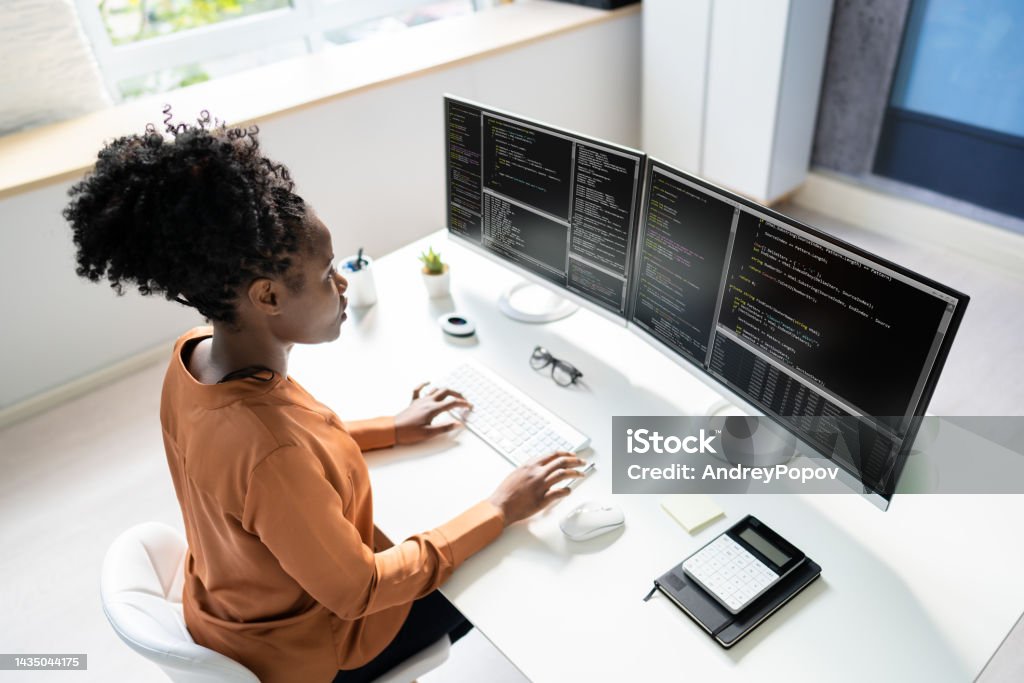 Computer Programmer Writing Program Code On Computer Stock Photo ...