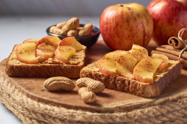 istock Toasted bread with peanut butter and apple. Quick and healthy breakfast ideas. 1435046003