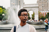 istock Portrait of a young adult afro-american woman in the city 1435048753
