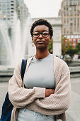 istock Portrait of a young adult afro-american woman in the city 1435048764