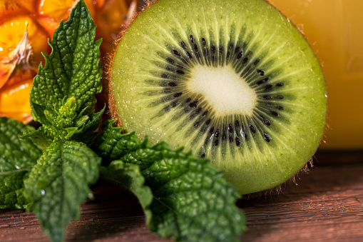 kiwi detail with ananas, mint branch.