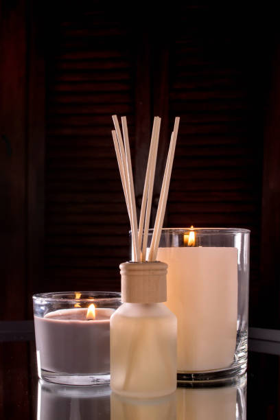 istock Aroma diffuser and scented candles that create coziness in the house. Romantic atmosphere. Details in the house that create coziness 1435049857