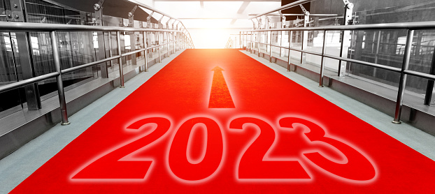 Red carpet entrance with new year number 2023 and arrow sign