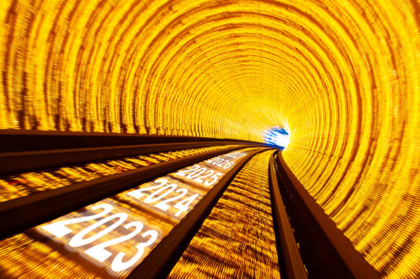 Train moving fast from 2023 to 2027 in tunnel