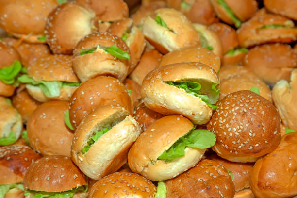 istock closeup of small breads stuffed with lettuce and chicken. 1435050844