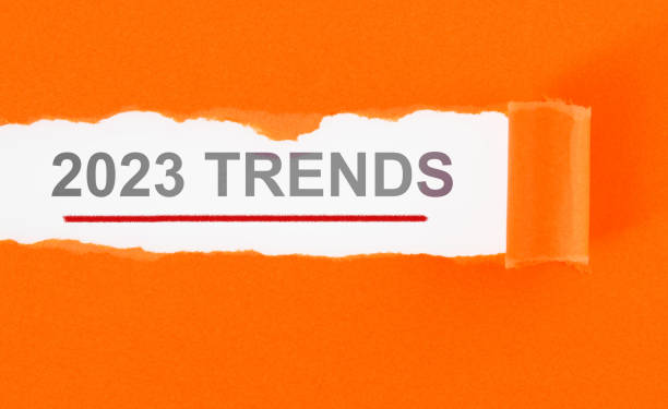 istock Torn orange color paper with space writing 2023 trends 1435051332