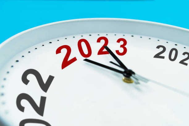 istock New year number 2022 and 2023 on clock 1435051457