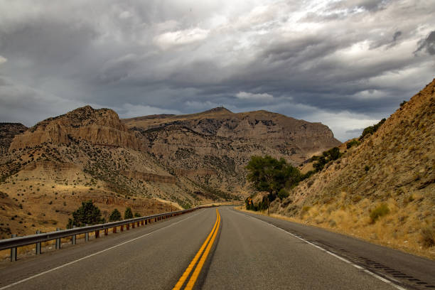 istock Thunderstorm over Canyon highway between Thermopolis and Cody, Wyoming 1435053749