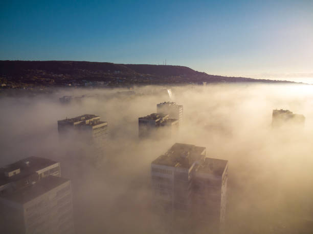 city in the fog in the morning aerial view, Varna Bulgaria stock photo