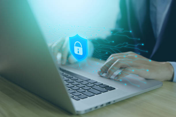 istock Businessman holding a shield icon with a tick mark. computer data password protection concept internet network security Cyber ​​digital technology. Business data and virus protection 1435054609