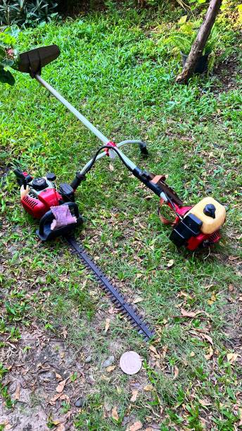 istock lawn mower lying on the floor 1435055722