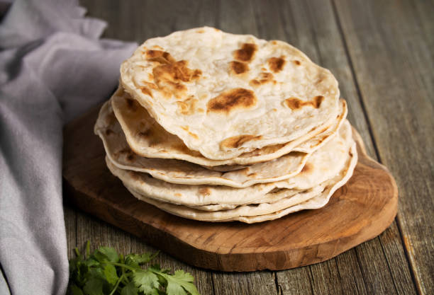 istock Indian chapati flatbread, creative photography with levitation 1435058382