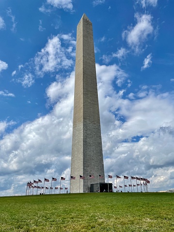Washington Monument Against Cloudy Sky. - Washington DC