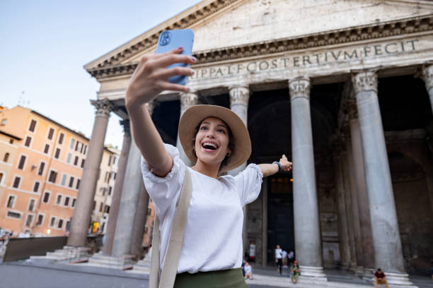 istock Happy tourist making a video call in Rome 1435061333