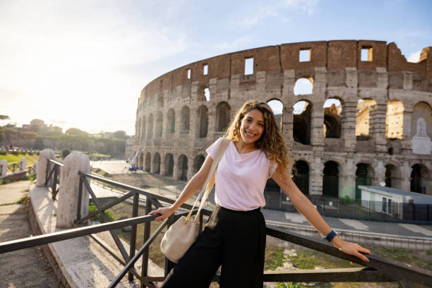 istock Happy tourist in Rome visiting the Coliseum 1435061378
