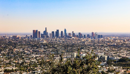 An aerial view of the beautiful Los Angeles skyline under a sunset sky