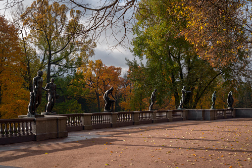 View of the granite terrace with statues in the Catherine Park in Tsarskoye Selo on a sunny autumn day, Pushkin, St. Petersburg, Russia