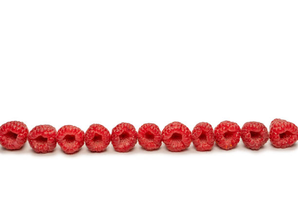 Tasty raspberries isolated on a white background.