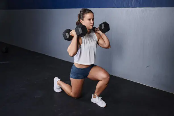 Photo of Dumbbell lunge