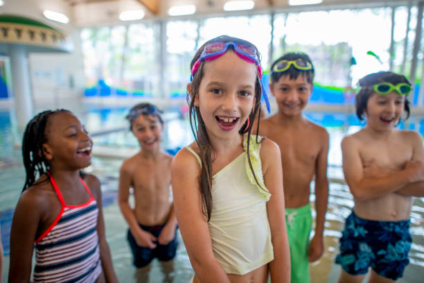 istock Children in a Swimming Lesson 1435066428