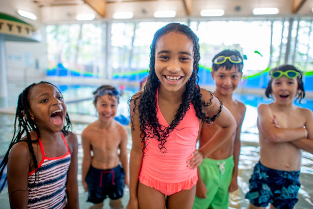 istock Children in a Swimming Lesson 1435066436