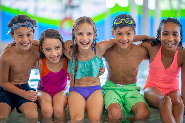 istock Children in a Swimming Lesson 1435066456